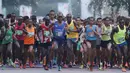 Pelari mengikuti lomba lari Milo Jakarta International 2017 di kawasan Epicentrum, Jakarta, Minggu (23/7/2017). Ajang lomba lari tersebut diikuti 15.000 peserta dengan kategori 5K, 10K dan Family Run 1,7K. (Bola.com/M Iqbal Ichsan)