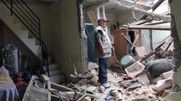 Insiden yang terjadi sekitar pukul 05.15 WIB, mengakibatkan sedikitnya 13 rumah warga mengalami kerusakan, mulai dari ringan hingga berat. (merdeka.com/Arie Basuki)