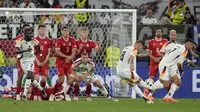 Timnas Jerman meraih kemenangan 1-0 atas Denmark pada laga 16 besar Euro 2024 di BVB Stadion Dortmund, Dortmund, Minggu (30/6/2024) dini hari WIB. Berkat hasil tersebut, Jerman melenggang ke perempat final dan akan menantang pemenang antara Spanyol atau Georgia. (AP Photo/Darko Vojinovic)