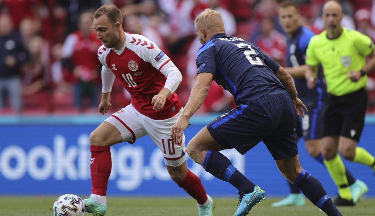 Bahkan peluang Christian Eriksen pun yang melepaskan tendangan keras dari luar kotak penalti berhasil dibendungnya pada menit ke-19. (Foto: Friedemann Vogel/Pool)