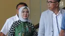 Ekspresi Dirut Pertamina Nicke Widyawati usai menjalani pemeriksaan oleh penyidik di Gedung KPK, Jakarta, Senin (10/6/2019). Nicke diperiksa sebagai saksi untuk tersangka mantan Dirut PLN Sofyan Basir terkait kasus dugaan suap proyek pembangunan PLTU Riau-1. (merdeka.com/Dwi Narwoko)