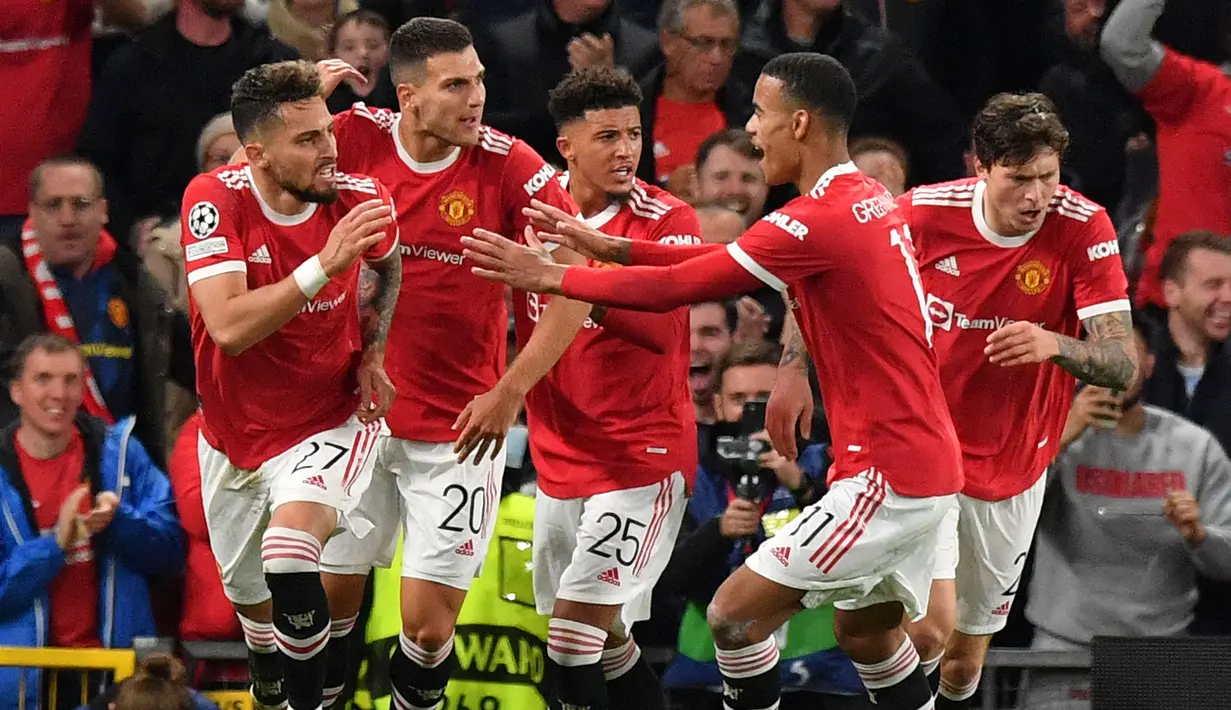 Sama seperti Juventus, Manchester United juga tersingkir di babak 16 besar. Setan Merah disingkirakan oleh Atletico Madrid dengan skor 1-2. Meskipun begitu, MU tetaplah menjadi salah satu penampil terbanyak di perempatfinal Liga Champions, yaitu 14 kali. (AFP/Anthony Devlin)