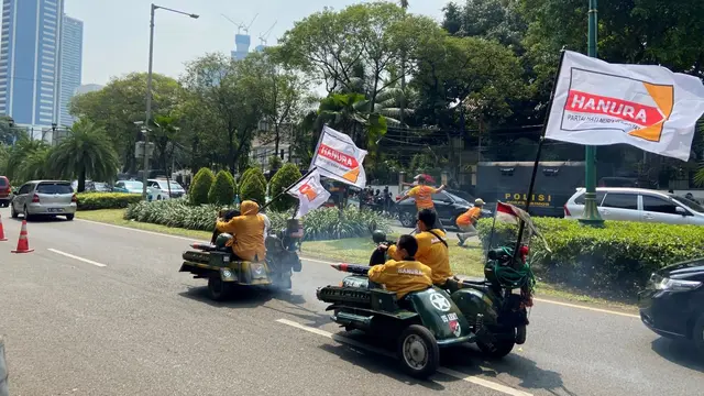 Foto Kendaraan yang membawa bendera Partai Hanura