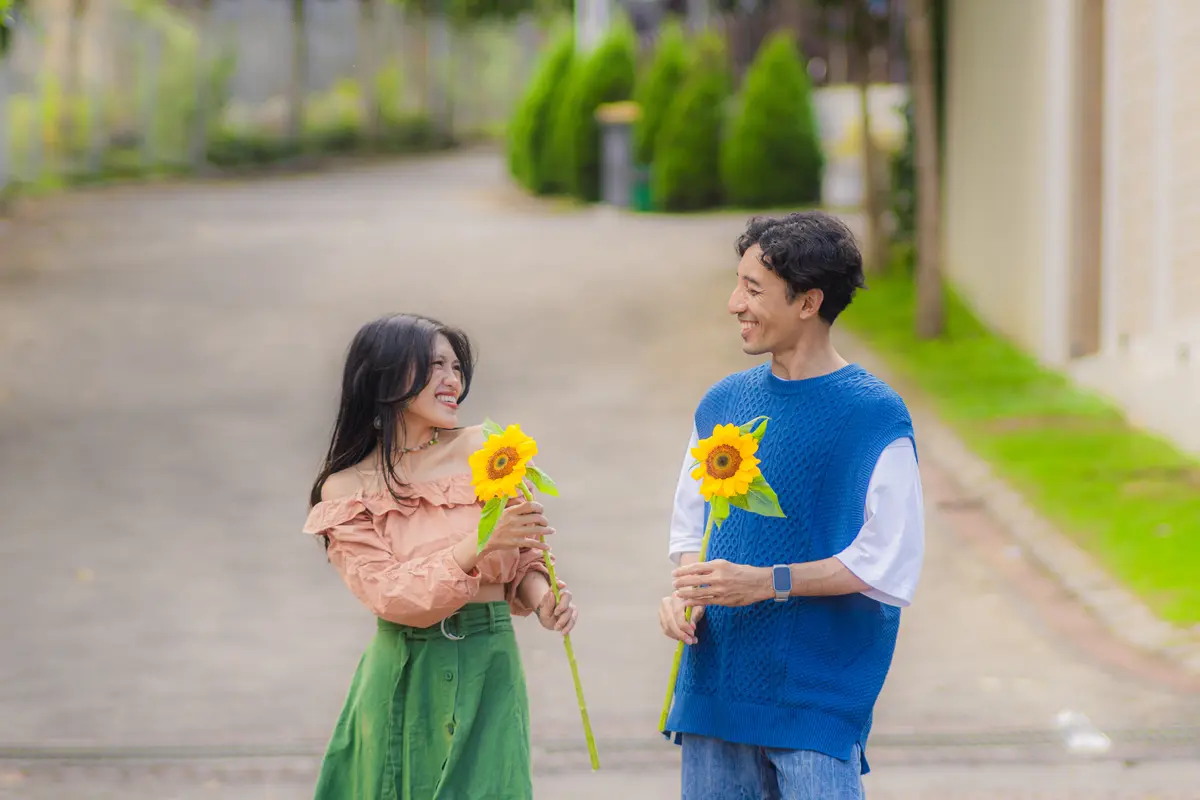 couple desember bunga matahari