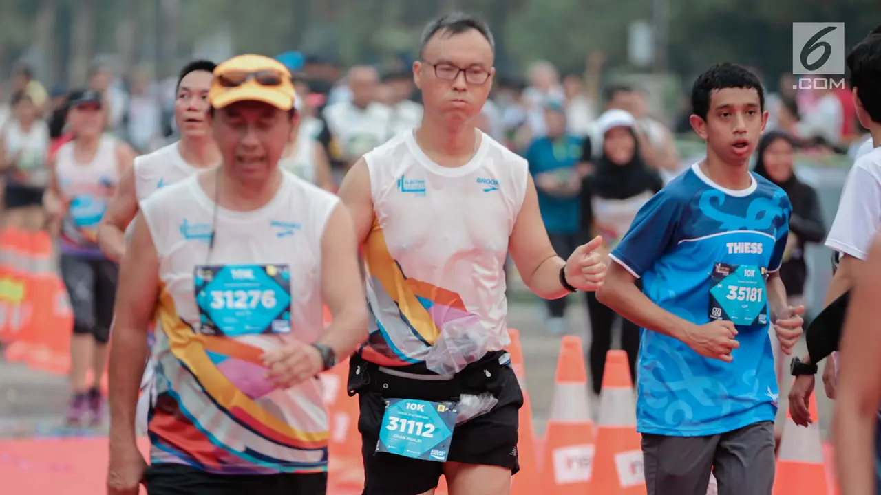 Ekspresi Pelari Jakarta Marahthon saat Mencapai Garis Finish