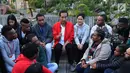 Presiden Joko Widodo bersama Ibu Negara Iriana Joko Widodo berbincang dengan pelajar dan mahasiswa Indonesia di Waterfront Wellington di  dekat dengan Museum Te Papa, Selandia Baru (19/3).  (Liputan6.com/Pool/Biro Pers Setpres)