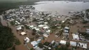 Rumah-rumah terendam banjir di Pantai Salinas setelah lewatnya Badai Fiona di Salinas, Puerto Rico, Senin, 19 September 2022. Badai Fiona yang menerjang Puerto Rico menyebabkan banjir dan tanah longsor. (AP Photo/Alejandro Granadillo)