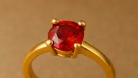 Sebagai hadiah, cincin emas bermata merah juga memiliki nilai sentimental tinggi. Diberikan dalam momen istimewa, cincin ini bisa menjadi simbol cinta dan penghargaan yang abadi. (chat GPT)