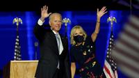 Joe Biden dan istri. (dok. Andrew Harnik / POOL / AFP)