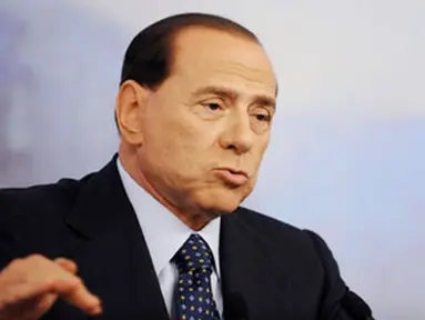Italian Prime Minister Silvio Berlusconi gestures during a press conference about a new foreign company forming an alliance with Alitalia to save the cash-strapped national airline from bankruptcy, on August 28, 2008 in Rome. AFP PHOTO/ Tiziana Fabi