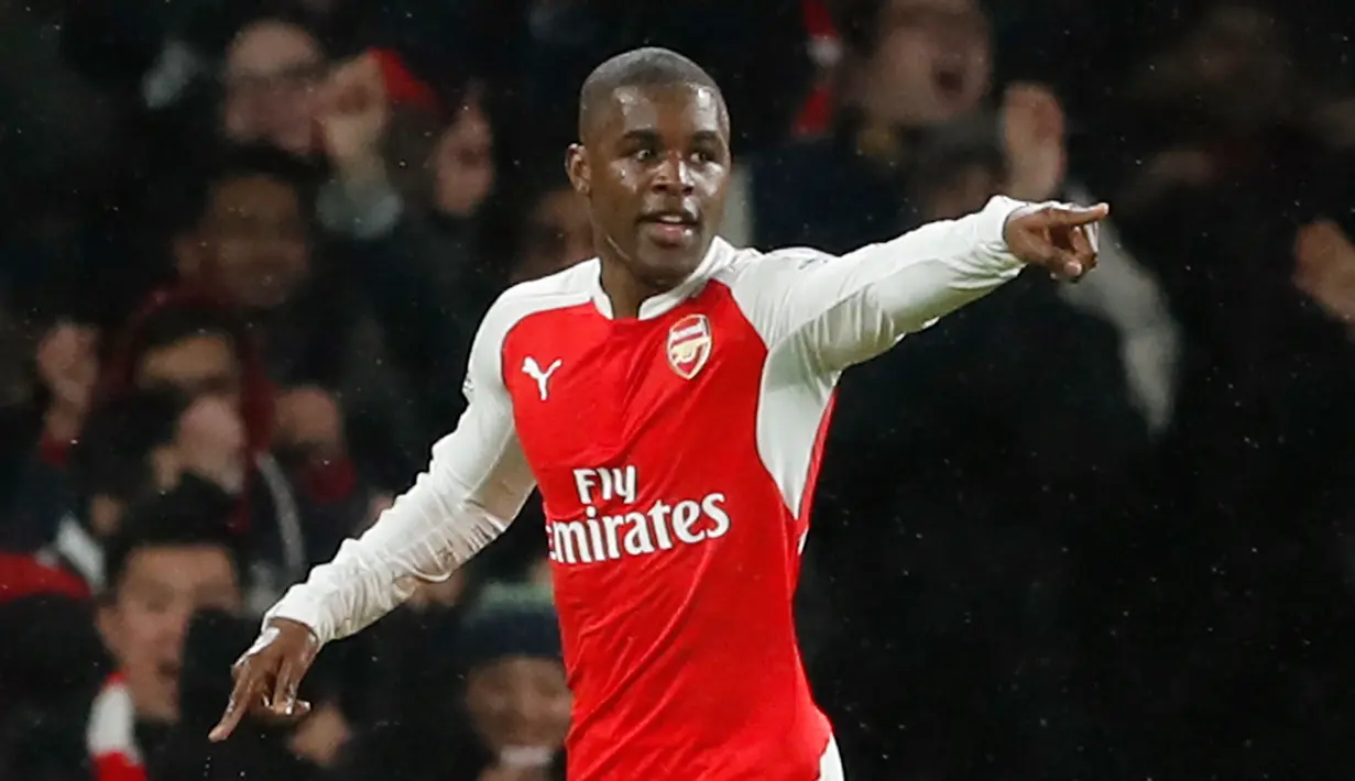 Penyerang Arsenal, Joel Campbell melakukan selebrasi usai mencetak gol kegawang Swansea City pada lanjutan liga Inggris di Stadion Emirates (2/3). Swansea menang atas Arsenal dengan skor 2-1. (Reuters/John Sibley)