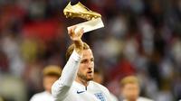 Penyerang Timnas Inggris, Harry Kane menjadi top skor Piala Dunia 2018. Bomber Tottenham Hotspur itu mengemas enam gol yang membuatnya memenangkan Sepatu Emas Piala Dunia di Rusia. (AFP/Glyn Kirk)