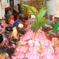 Prosesi adat antar harta atau dutu yang digelar saat pesta pernikahan di Gorontalo (Arfandi/Liputan6.com)