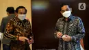 Menteri Perdagangan Agus Suparmanto (kanan) berbincang dengan Direktur SCM, Imam Sudjarwo usai menyambangi PT Elang Mahkota Teknologi Tbk (Emtek) dan Indosiar Grup di SCTV Tower Jakarta, Rabu (12/8/2020). (Liputan6.com/Johan Tallo)