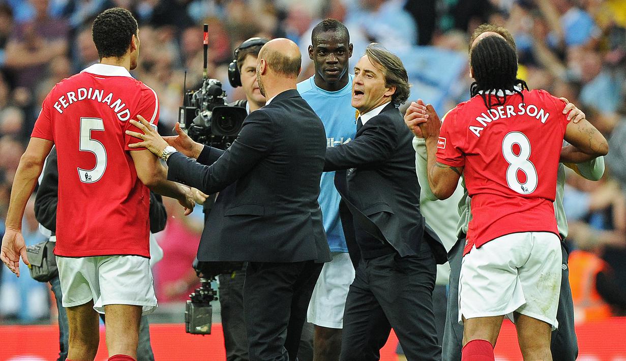 Kolaborasi keduanya menghasilkan dua gelar bagi Manchester City. Piala FA menjadi yang pertama diraih pada akhir musim 2010/2011 dan dilanjutkan dengan gelar kedua di musim berikutnya yaitu juara Premier League 2011/2012. (AFP/Carl De Souza)