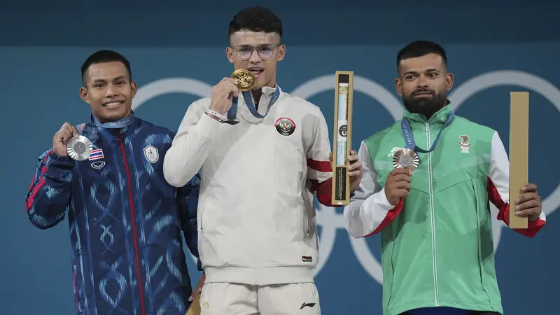 Foto: Pecahkan Rekor Olimpiade, Rizki Juniansyah Sumbang Emas Kedua Indonesia di Olimpiade Paris 2024