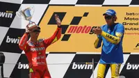 Valentino Rossi memenangi persaingan dengan Marco Melandri pada MotoGP Jerman 2006. (Motorsport)