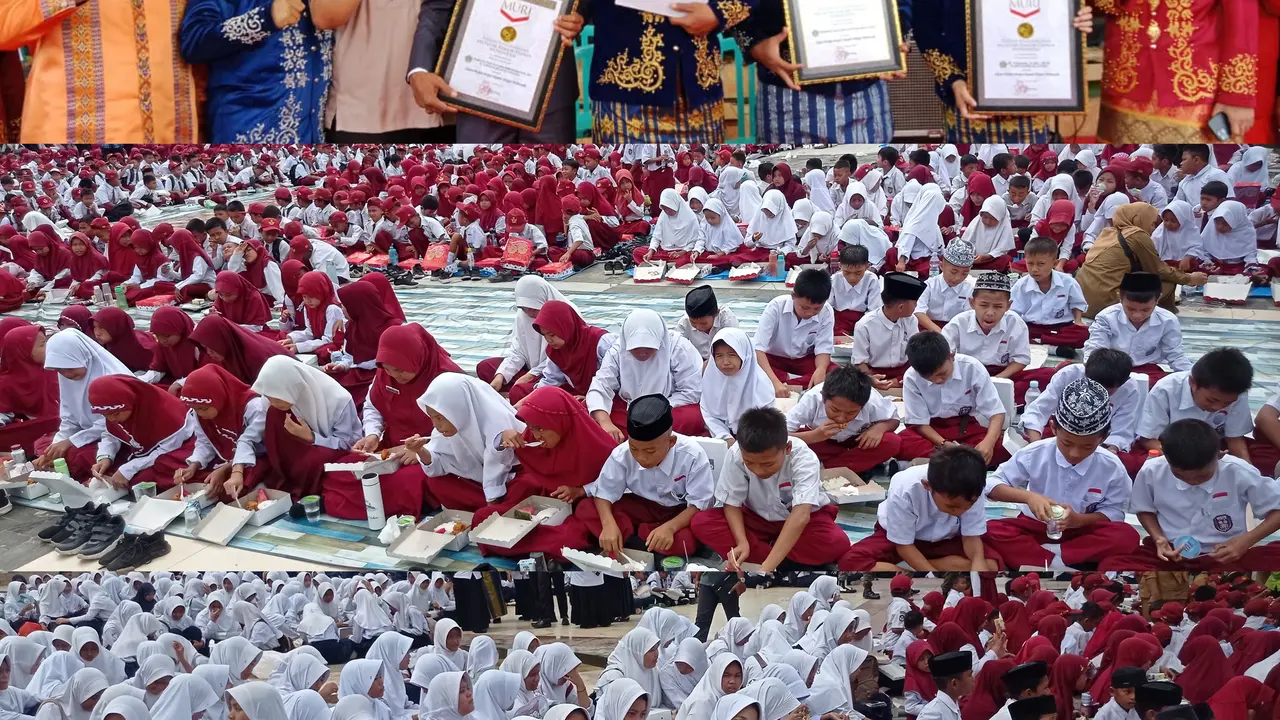 Pihak MURI melalui Andri Purwandono dan Pj Bupati Kolaka Utara Yusmin, saat menyerahkan Piagam Rekor kegiatan makan bergizi gratis serentak kepada 22.000 pelajar, Selasa (7/1/2025).