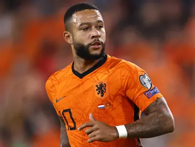 Memphis Depay tercatat telah menyumbangkan 12 gol untuk Belanda dalam Kualifikasi Piala Dunia 2022. Hingga saat ini, Depay tercatat mampu mengoleksi total 37 gol bersama Skuat De Oranje. Skuat De Oranje tak mengalami kendala yang berarti untuk lolos dari kualifikasi. (AFP/ANP/Maurice Van Steen)