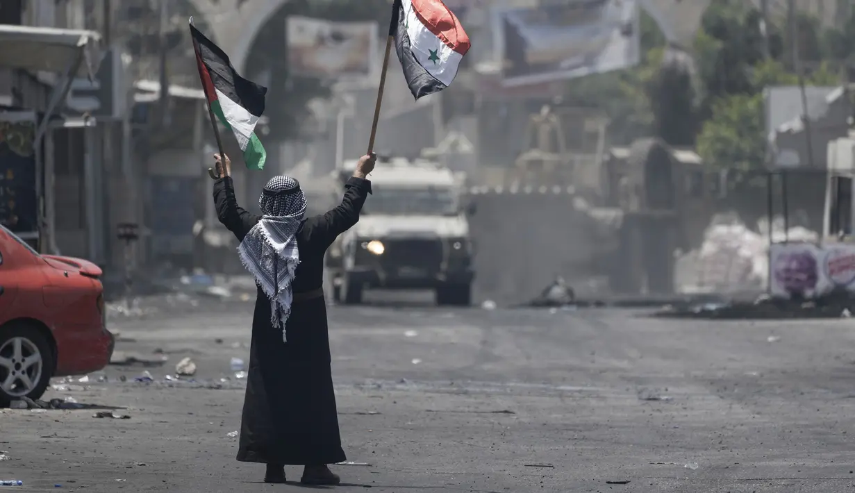 <p>Rangkaian konflik tersebut menjadi salah satu operasi militer Israel terbesar setelah hampir dua dekade ini. (AP Photo/Majdi Mohammed)</p>
