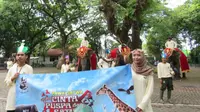 Pawai Penghuni Kebun Binatang Surabaya. (Liputan6.com/Dian Kurniawan)