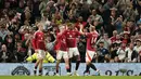 Pemain Manchester United merayakan gol ke gawang Barnsley yang dicetak oleh Marcus Rashford (kedua kanan) pada laga Carabao Cup 2024/2025 di Old Trafford, Manchester, Inggris, Rabu (18/09/2024) WIB. (AP Photo/Dave Thompson)