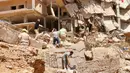 Pihak otoritas Libya melaporkan sedikitnya 5.300 jiwa menjadi korban dalam bencana ini. (AP Photo/Yousef Murad)