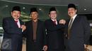 (ki-ka) Ketua PPATK Kiagus Ahmad Badaruddin, Mantan Ketua PPATK M Yusuf, Wakil Ketua PPATK, Dian Ediana Rae dan Mantan Wakil Ketua PPATK, Agus Santoso foto bersama usai sertijab di Gedung PPATK, Jakarta, Rabu (26/10). (Liputan6.com/Angga Yuniar)