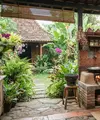 Model dapur terbuka di belakang rumah kampung yang estetik (AI Generated)