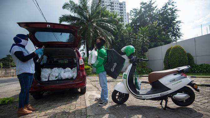 Meriahkan Ramadan, Grab dan YPO Bagikan 100.000 Paket Berbuka Bagi 25.000 KK di Jakarta. Kredit: Grab