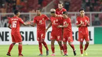 Para pemain Persija Jakarta merayakan gol yang dicetak oleh Bruno Matos ke gawang Shan United pada laga Piala AFC 2019 di SUGBK, Jakarta, Rabu (15/5). (Bola.com/M Iqbal Ichsan)