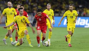 Laga Timnas Malaysia vs Vietnam di putaran ketiga kualifikasi Piala Asia 2027 di Stadion Nasional Bukit Jalil, Kuala Lumpur, Selasa (10-6-2025). (Dok. vff.org.vn)