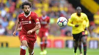 Pemain Liverpool, Mohamed Salah mengoleksi lima tembakan terbanyak ke arah gawang termasuk satu gol yang dicetak saat timnya melawan Watford pada laga perdana Premier League 2017-2018. (AFP/Olly Greenwood)