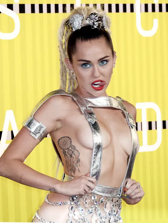 Miley Cyrus nampaknya memiliki caranya tersendiri untuk menjadi perhatian publik, Miley kini merilis album. (Bintang/EPA)