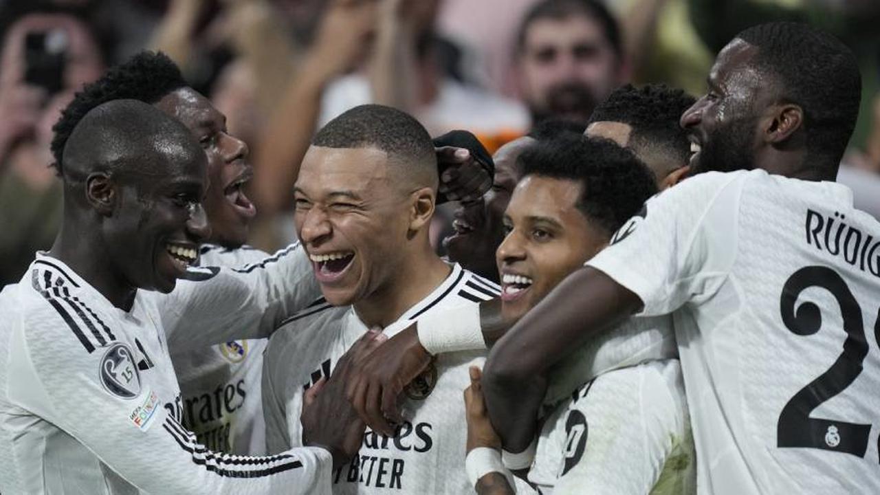 Kylian Mbappe merayakan gol Real Madrid dalam laga kontra Manchester City di Liga Champions 2024/2025, Kamis (20/2/2025) dini hari WIB. (c) AP Photo/Bernat Armangue