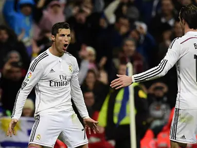 Penjualan jersey dari Real Madrid berada pada posisi pertama dengan angka 1,4 juta per tahun. Jersey bernama Cristiano Ronaldo menjadi salah satu yang terlaris. (AFP Photo/Javier Soriano)
