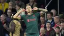 Darwin Nunez telah mencetak 5 gol sejak kedatangannya ke Liverpool pada musim 2022/2023 ini. Ia tercatat mampu menciptakan 3 gol dan 1 assist dari 7 penampilannya di Liga Inggris. Selain itu, 2 gol tambahan lainnya dicetak saat tampil di Liga Champions. Berikut deretan 5 gol pertama Darwin Nunez bersama Liverpool pada musim 2022/2023. (AP/Peter De Jong)