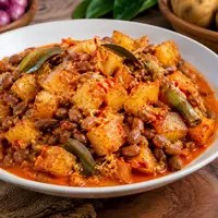 Ilustrasi Resep Sambal Goreng Kentang dengan Kacang Tolo dan Santan/AI Generated