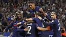 Skor 2-0 bertahan hingga akhir pertandingan. Prancis pun nyaman di puncak klasemen Grup D dengan 12 poin dari 6 laga yang telah dimainkan. Sementara Finlandia di posisi ke-3 dengan mengoleksi 5 poin dari 4 laga yang baru dimainkan. (Foto: AP/Laurent Cipriani)