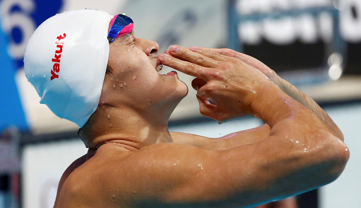 Ekspresi perenang Tiongkok, Sun Yang, setelah memenangi final nomor 800m gaya bebas putra renang Kejuaraan Dunia Akuatik 2015 di Kazan, Rusia. (5/8/2015). (Reuters/Michael Dalder)
