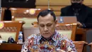 Ketua Komisi Pemberantasan Korupsi (KPK) Firli Bahuri saat mengikuti rapat kerja dengan Komisi III DPR di Jakarta, Rabu (8/6/2022). Rapat yang berlangsung tertutup tersebut membahas RKA K/L Tahun 2023. (Liputan6.com/Angga Yuniar)