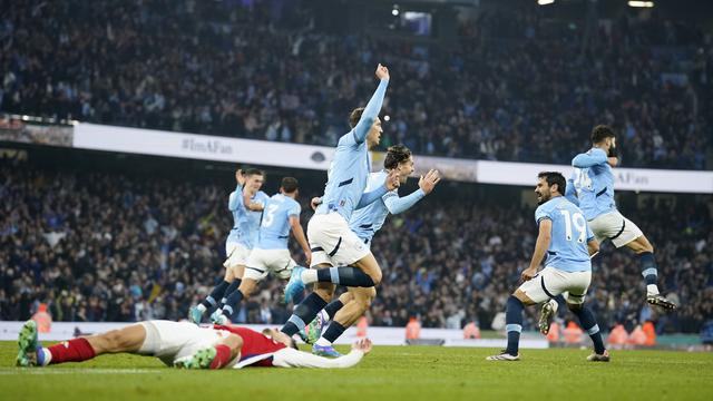 Foto: Melihat Gol Pamungkas John Stones yang Buyarkan Kemenangan di Depan Mata Arsenal Atas Manchester City