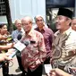 Tim Independen memberikan keterangan kepada pers usai temui Presiden Joko Widodo di Istana Negara, Jakarta, Rabu (28/1/2015). (Liputan6.com/Faizal Fanani)