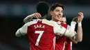 Bukayo Saka. Sayap Arsenal berusia 20 tahun ini mulai dipercaya mengenakan jersey nomor punggung 7 pada awal musim 2020/2021 lalu. Ia mewarisi nomor tersebut dari Henrikh Mkhitaryan. Sebelumnya ia mengenakan nomor punggung 77 sejak kedatangannya pada 2018/2019. (Foto: AFP/Pool/Catherine Ivill)