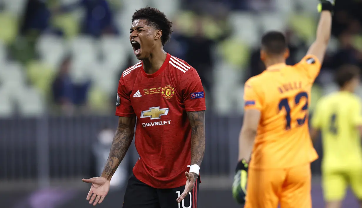 Marcus Rashford. Dengan meraih poin 5, adalah pemain terburuk Manchester United di laga ini. Ia gagal memanfaatkan sebuah peluang emas untuk membawa Manchester United unggul 2-1. Pengambilan keputusannya juga kadang tidak akurat. (AP/Kacper Pempel/Pool)