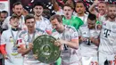 Namun musim ini segalanya berubah. Kane tampil trengginas dengan mencetak 80 gol dari 89 pertandingan bersama Bayern, menjelma sebagai tumpuan lini depan Die Roten. (AP Photo/Matthias Schrader)