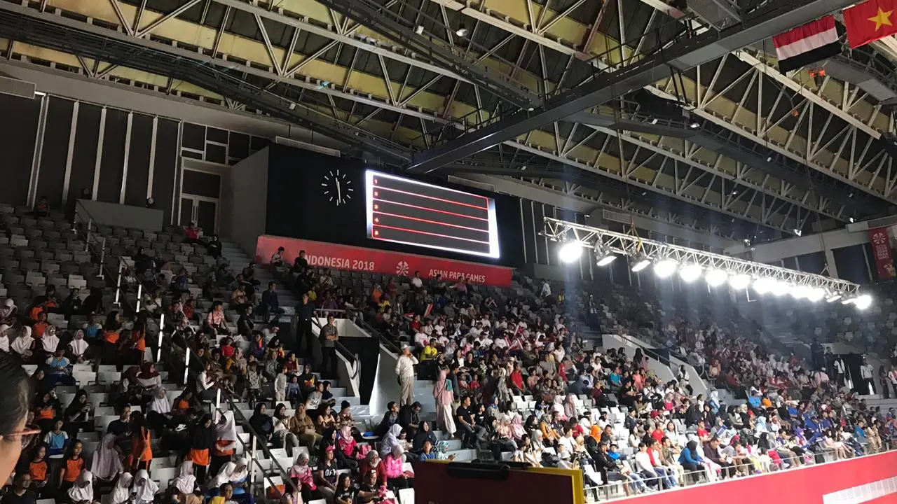 Para pelajar menyaksikan Asian Para Games 2018 (Liputan6.com / Ahmad Fawwaz)
