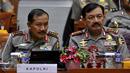 Kapolri Jenderal Badrodin Haiti dan Wakapolri Komjen Pol Budi Gunawan mengikuti Rapat Kerja dengan Komisi III DPR RI di Kompleks Parlemen, Jakarta, Senin (25/1). Rapat tersebut membahas kinerja Polri dan program kerja untuk 2016 (Liputan6.com/Johan Tallo)