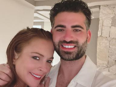 Aktris sekaligus penyanyi Lindsay Lohan resmi menikah dengan pujaan hatinya Bader Shammas setelah tiga tahun menjalin asmara. Lindsay Lohan membagikan kabar gembira tersebut melalui sebuah unggahan di akun Instagram pribadinya pada 2 Juli 2022. (FOTO: instagram.com/lindsaylohan/)