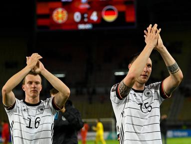 Timnas Jerman menjadi tim pertama selain tuan rumah Qatar yang memastikan lolos ke Putaran Final Piala Dunia 2022. Hasil itu didapat usai Tim Panser menang telak 4-0 atas tuan rumah Makedonia Utara dalam laga Kualifikasi Zona Eropa Grup J, Minggu (11/10/2021). (AFP/Nikolay Doychinov)